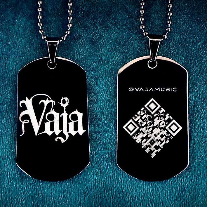 Black glossy Vaja dog tags with a silver Vaja logo and black chain.